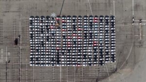 Aerial shot of an organized parking lot filled with cars in Seattle, WA.
