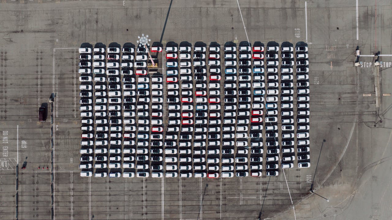 Aerial shot of an organized parking lot filled with cars in Seattle, WA.